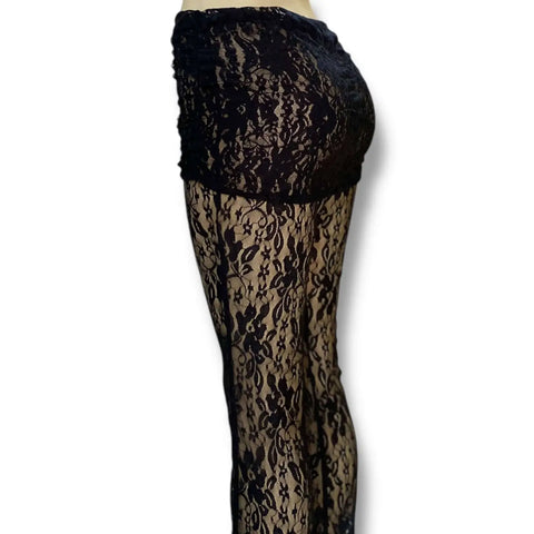 Black sheer floral lace pants with high waist and adjustable mesh panel, gothic punk flared festival style.