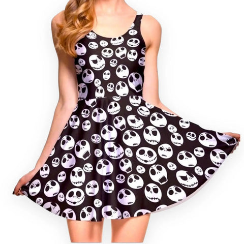 Black sleeveless mini dress with white skull print, round neckline, and fit & flare silhouette. Edgy punk and whimsygoth summer style.