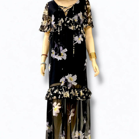 Black v-neck floral summer maxi dress with lace-up neckline, empire waist, and ruffle trim hem by Flying Tomato – boho chic fashion front view