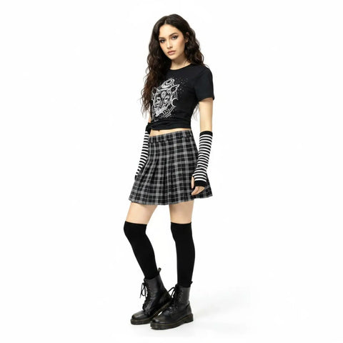 Black plaid pleated mini skirt with built-in shorts, tartan check pattern and side zipper closure