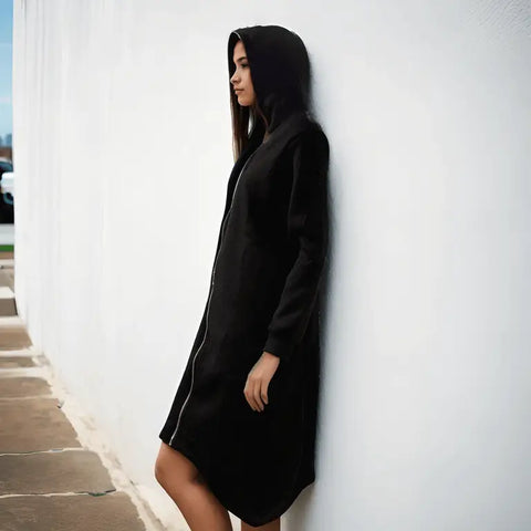 Black zip up face hooded long jacket with full zip hood that covers face, oversized fit, side pockets, ribbed cuffs, and high-low asymmetrical hem, sizes 2XL and 3XL