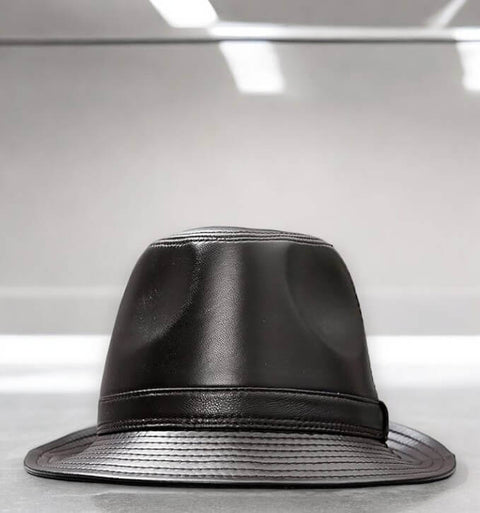 Retro Leather Trilby Fedora Hat dark brown close up on counter