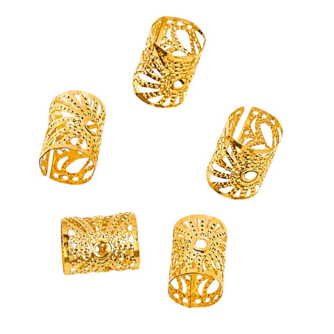 Five boho gold starburst hair cuffs for braids, twists, faux locs, and dreadlocks flat lay white background