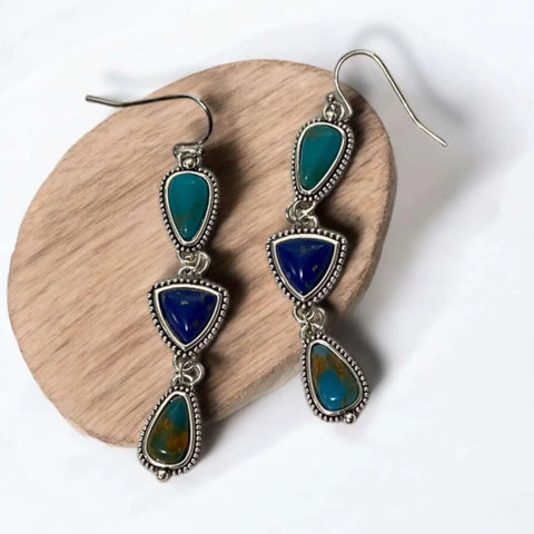 Boho western multi stone dangle earrings with turquoise and lapis style stones in braided silver settings.
