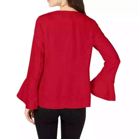 woman wearing back view Bold Red Bell Sleeve Blazer with tulip cuffs, collarless open front, thigh-length cut, and functional pockets