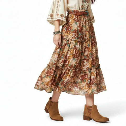 woman wearing Western Brown Suede Leather Ankle Boots with contrast gore panels and patterned stacked heel