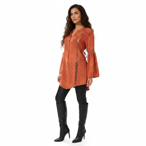 woman wearing with black pants and boots Burnt Orange Boho Tunic Top with crochet panels, button-up V-neckline, flare sleeves, and back tie medium