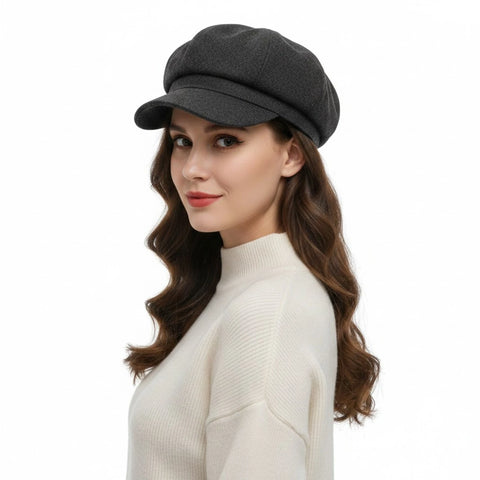 woman wearing dark gray Women’s Solid Color Newsboy Hat with 8-panel crown and curved brim / one size