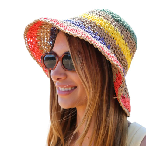 Colorful multi striped straw sun bucket hat with crochet raffia texture, adjustable brim, and Y2K summer style