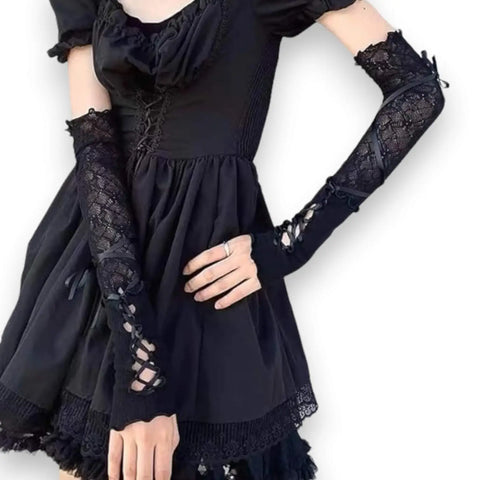 woman wearing black Corset Lace Up Long Arm Covers in black or white floral lace with open-hand design / osfm