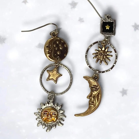 Cosmic Sun Moon Star Dangle Earrings with mixed metal silver and gold celestial charms and fish hook backs