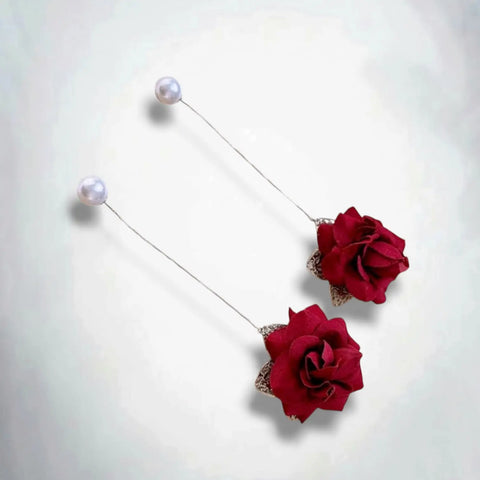 flat lay Dark Red Velvet Rose Pearl Statement Earrings with silver chain threaders and gothic style