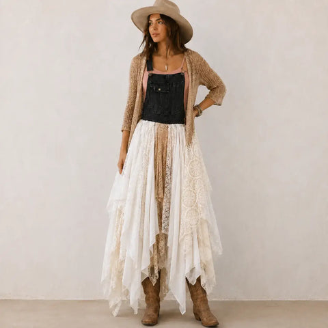 woman wearing Denim & Lace Asymmetric Midi Dress with black overall bodice, adjustable straps, white lace with long duster