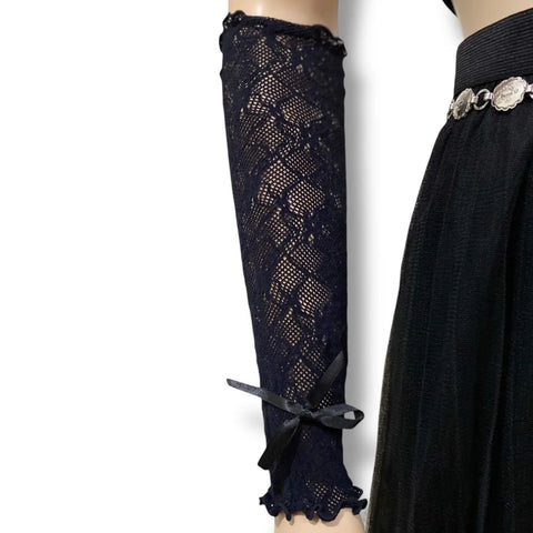 Elegant Long Lace Arm Cover Gloves in black with diamond lace texture, floral accents, and ruffled ribbon trim, 15" length, one size