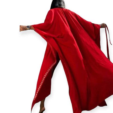 Elegant red tribal embroidery maxi kimono with white embroidered stars, high side slits, and sash waist tie for boho beachwear and summer fashion.
