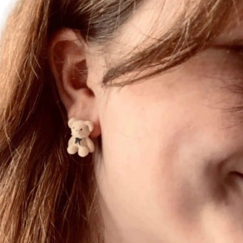Fuzzy Teddy Bears Post Earrings with flocked plush texture, black eyes and nose, bow tie detail, and 925 sterling silver posts in pink tan or brown