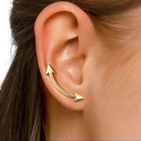 woman wearing Gold Dual Arrow Crawler Earrings with minimalist slider design and boho western arrow detail one size