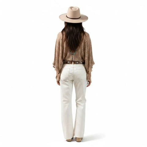 High Rise White Ripped Knee Straight Leg Jeans with ripped knees, brown stitching and cropped off-white denim fit