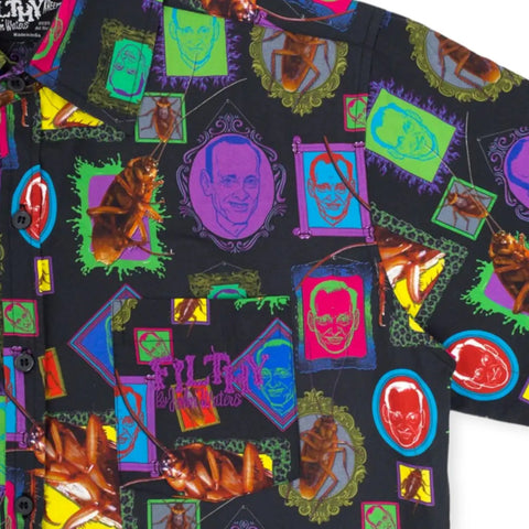 John Waters graphic camp shirt in 100% cotton with all-over portrait print and pink embroidered pocket logo. Short sleeve button-up relaxed fit. Size XXL.