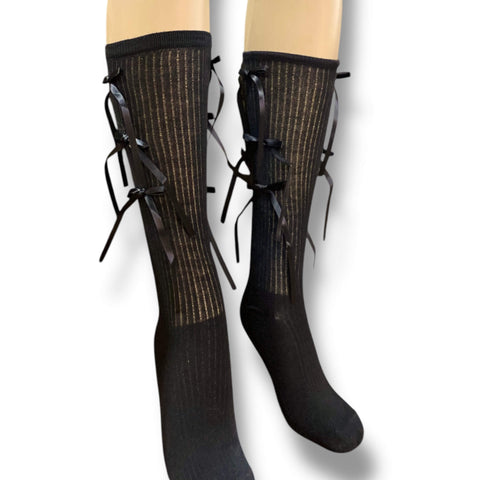 Black knee high socks with matching satin bow ribbons, gothic coquette legwear for festivals and fashion.