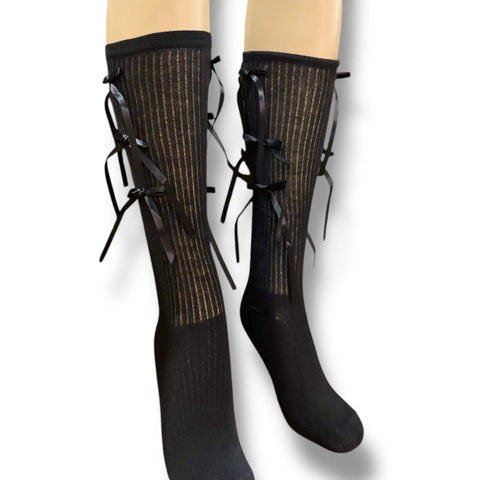 Black knee high socks with matching satin bow ribbons, gothic coquette legwear for festivals and fashion.