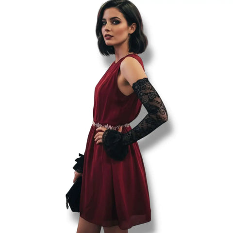 Model wearing Lace Ruffle Arm Covers Extra Long Sleeves Lace Ruffle Arm with a red dress and a stylish clutch bag.