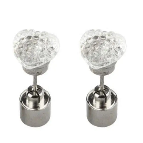 Clear close-up glowing LED heart post earrings with stainless steel backings on white background