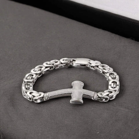 Men's Stainless Steel Cross Bracelet with textured silver cross and Byzantine chain links in polished 316L steel
