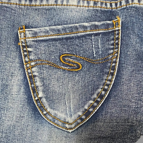 Mid Rise Distressed Denim Skinny Jeans