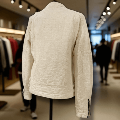 Ivory Textured Biker Jacket with black zipper accents, asymmetric moto front, snap collar, and palm print lining – edgy women's mid weight cotton jacket. 