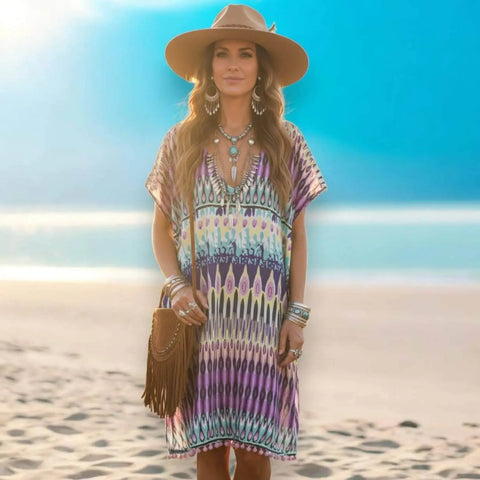 Multicolor Abstract Print Tunic Cover Up wearing on a beach with accessories 
