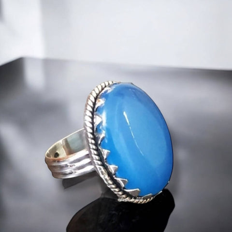 Natural Blue Chalcedony Stone Sterling Silver Ring with oval cabochon, serrated crown bezel, and braided rope edge  ring size 8