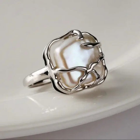 Pearl Sterling Silver Vine Ring with adjustable band and square faux pearl in vine wrap design – elegant boho Y2K jewelry.

