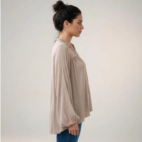 Pink Ruffle V-Neck Long Sleeve Blouse in soft pink rayon with frill neckline, gathered cuffs, and hi-low hem model wearing medium
