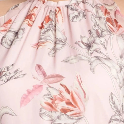 woman wearing Plus Pink Sleeveless Floral Ruffle Midi Dress with frill mock neckline, waist tie, high-low tulip hem, and full lining