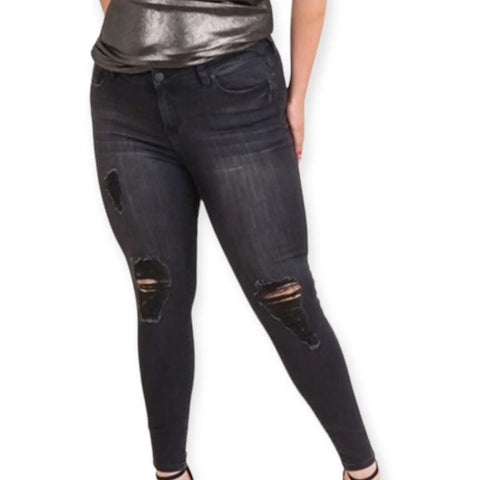 Plus Size Black Ripped Mid-Rise Skinny Jeans with stretch denim and five pocket design, zip-up button closure, sizes 16R and 18R with 28 inch inseam