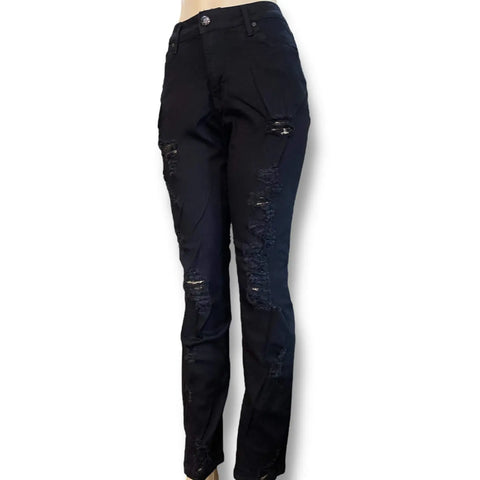 Plus size mid rise black ripped skinny jeans with distressed detail and triple button closure