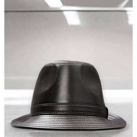 Retro Leather Trilby Fedora Hat dark brown close up on counter