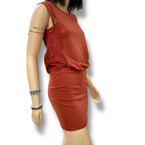 Rustic Brown Sleeveless Bodycon Mini Dress with brass studs, floral lace side panels, and fitted boho western silhouette model wearing small 