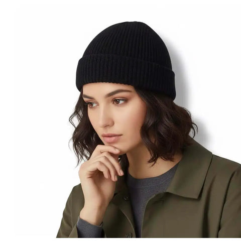 model wearing black Short Fisherman Beanie Skull Cap solid colors chunky rib knit, rolled cuff, short fit, and unisex skull cap style 