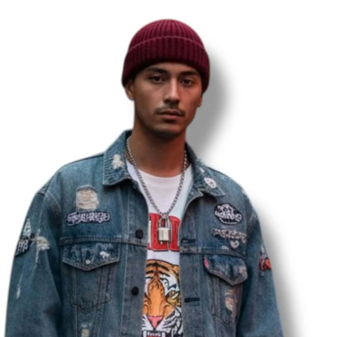 model wearing burgundy red Short Fisherman Beanie Skull Cap solid colors chunky rib knit, rolled cuff, short fit, and unisex skull cap style 