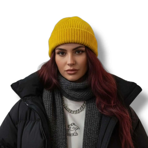 model wearing yellow Short Fisherman Beanie Skull Cap solid colors chunky rib knit, rolled cuff, short fit, and unisex skull cap style 