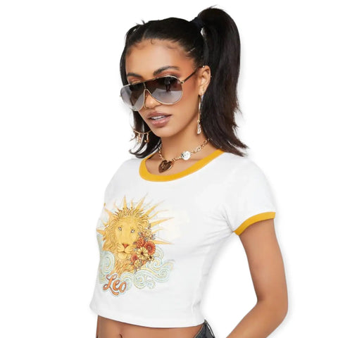 loyal lioness short sleeve graphic leo baby tee with sunburst lion print white crop top with tan contrast trim