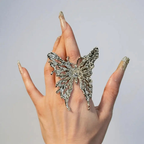 Silver Big Butterfly Flying Ring with wide filigree cutout wings and adjustable band – statement fairycore fashion jewelry for women