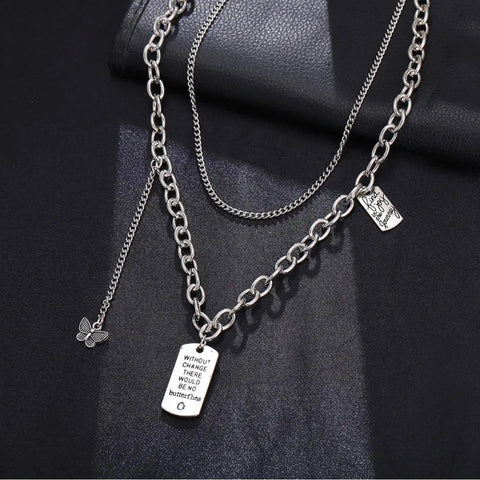 Silver butterfly charming layered necklace with mixed round and curb chains and “Find Joy in the Journey” quote tag, 18 inch length plus 2 inch extension