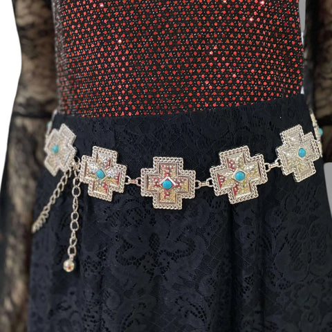 Silver turquoise cross western chain belt with textured cross medallion links and green faux turquoise centers, adjustable clasp closure, worn at waist or hips.