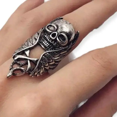 Silver winged skull serpent ring in antique silver with elongated design showing skull, wing, and serpent detail, statement ring sizes 9 10 11