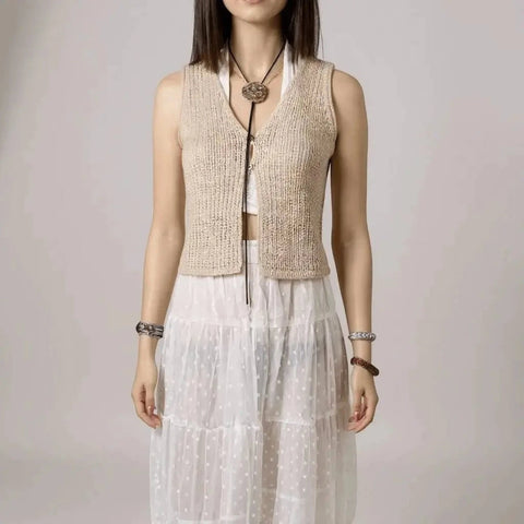 woman wearing with white outfit Tan Sleeveless V Neck Knit Vest Top in crochet knit with cropped two-button cardigan vest style / women's/ large