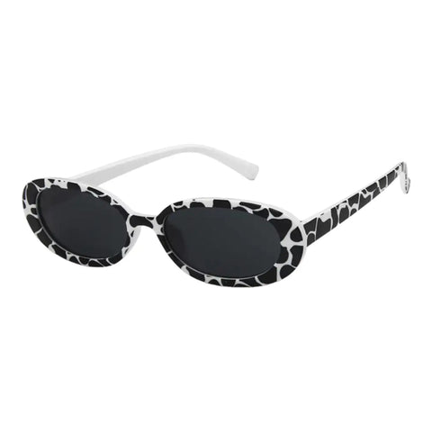 Women’s vintage-inspired oval sunglasses in a black and white and stylish summer look.
