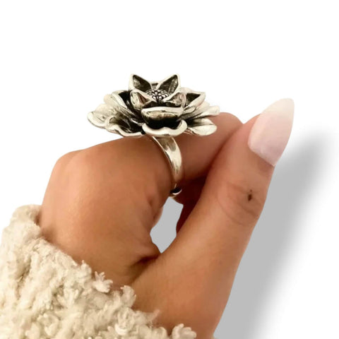 woman wearing on index finger Sterling Silver Antique Flower Statement Ring with 3D floral petals and dark center